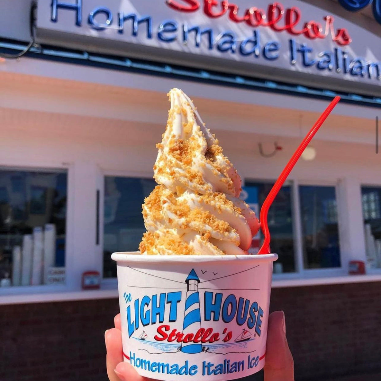 A Strollo's Lighthouse soft serve ice cream cup