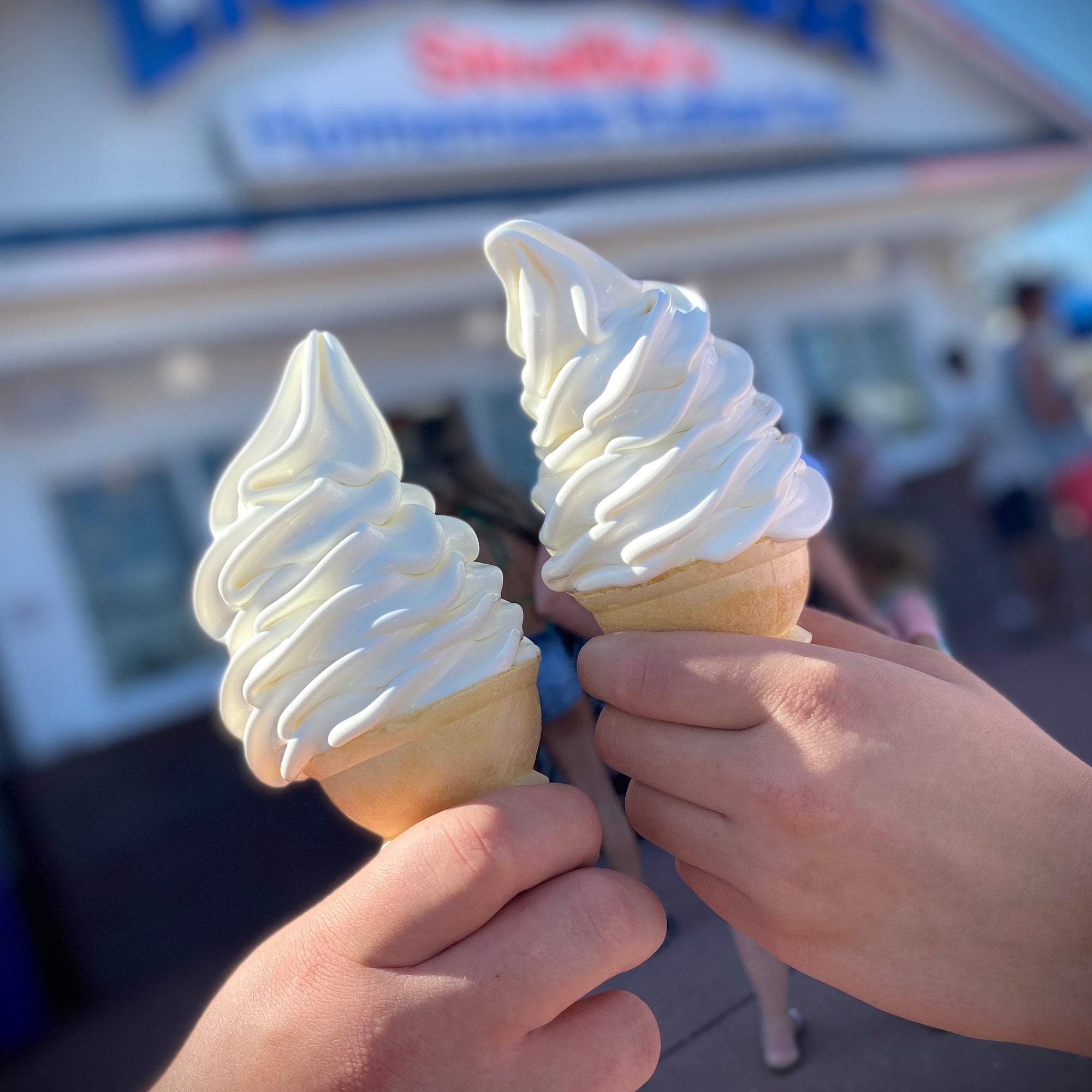 Two Strollo's Lighthouse vanilla soft serve ice cream cones