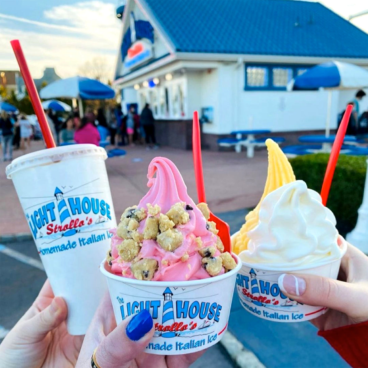 Strollo's Lighthouse treats, including a vanilla shake, strawberry Italian Ice with cookie dough topping, and mango Italian Ice with vanilla soft serve ice cream