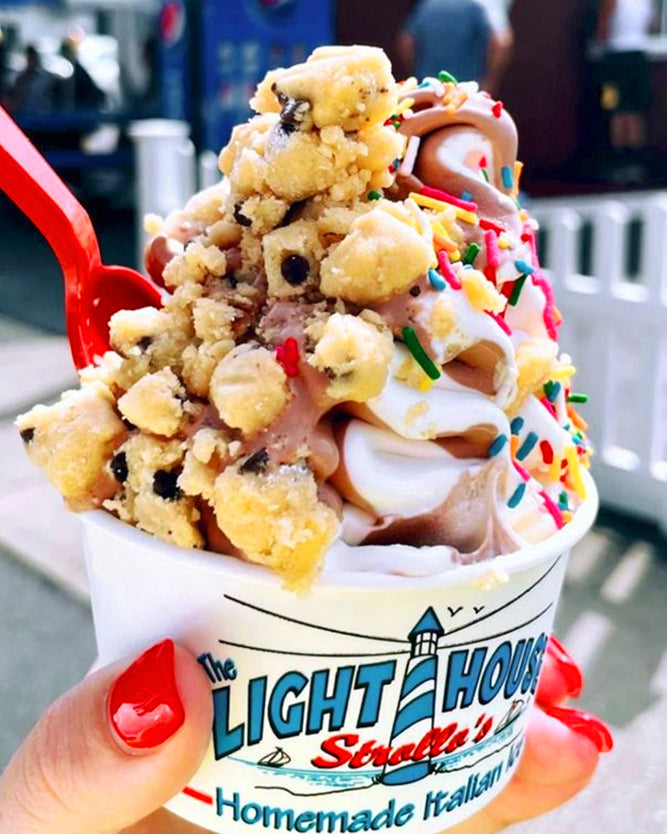 A Strollo's Lighthouse cup of vanilla-chocolate twist soft serve ice cream covered with cookie dough and rainbow sprinkles